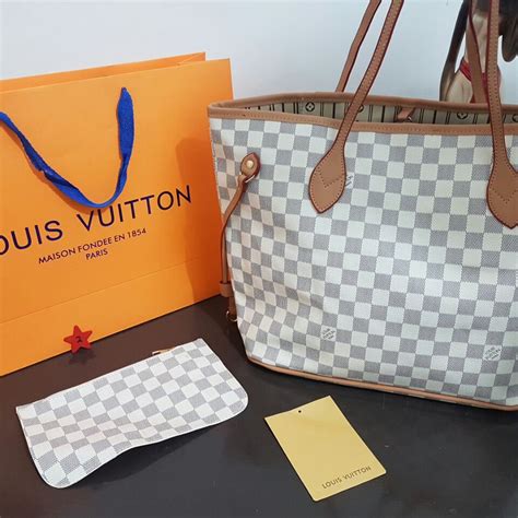 bolsa lv original vs clon|louis vuitton bolsos falsos.